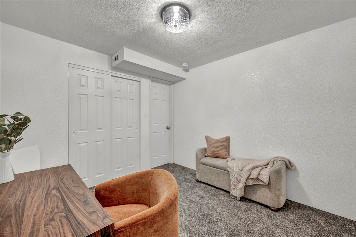 If it's a working vacay this space with desk and chair is perfect.