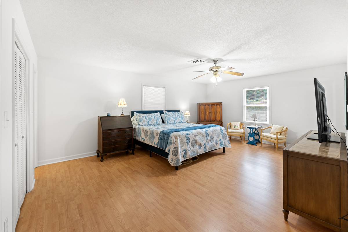 Main Bedroom upstairs with King bed, large TV and ensuite