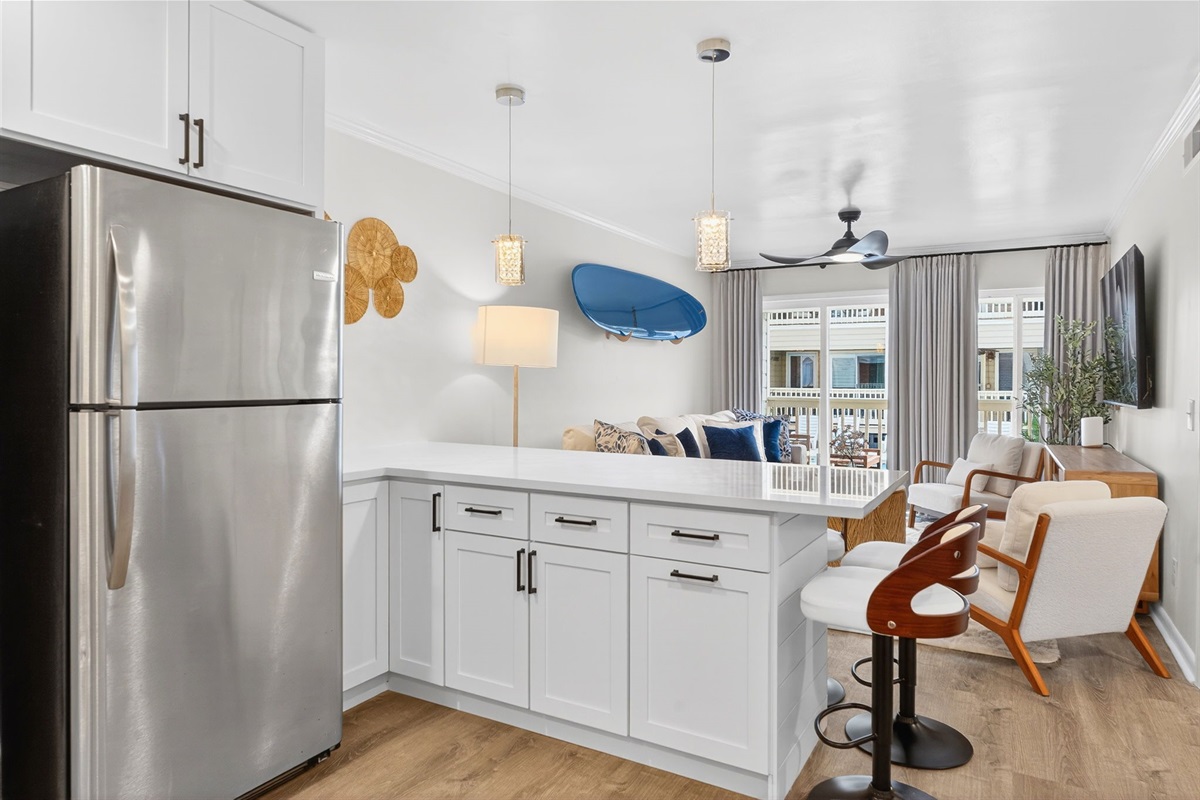 Dining & Living Room | Beach Break | IOP Escapes Vacation Rentals | 1400 Ocean Blvd 106B, Isle of Palms SC