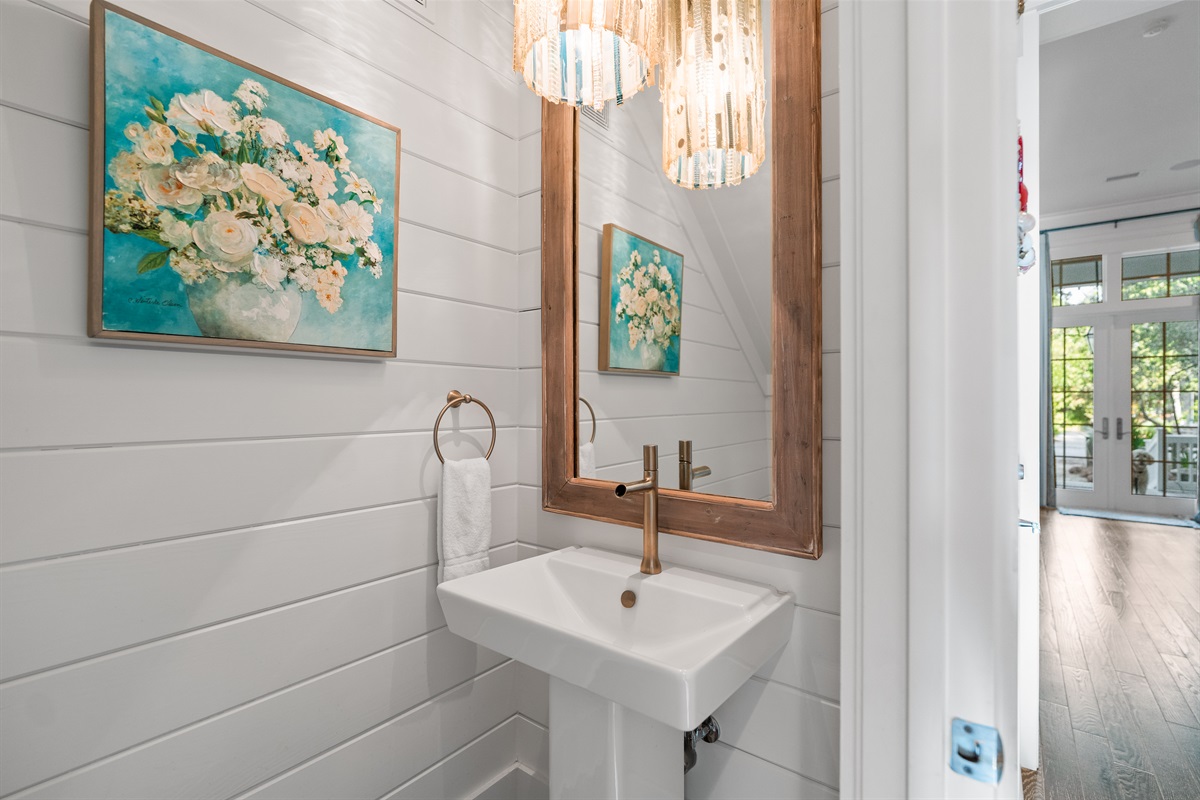 Main floor powder half bath/powder room. 