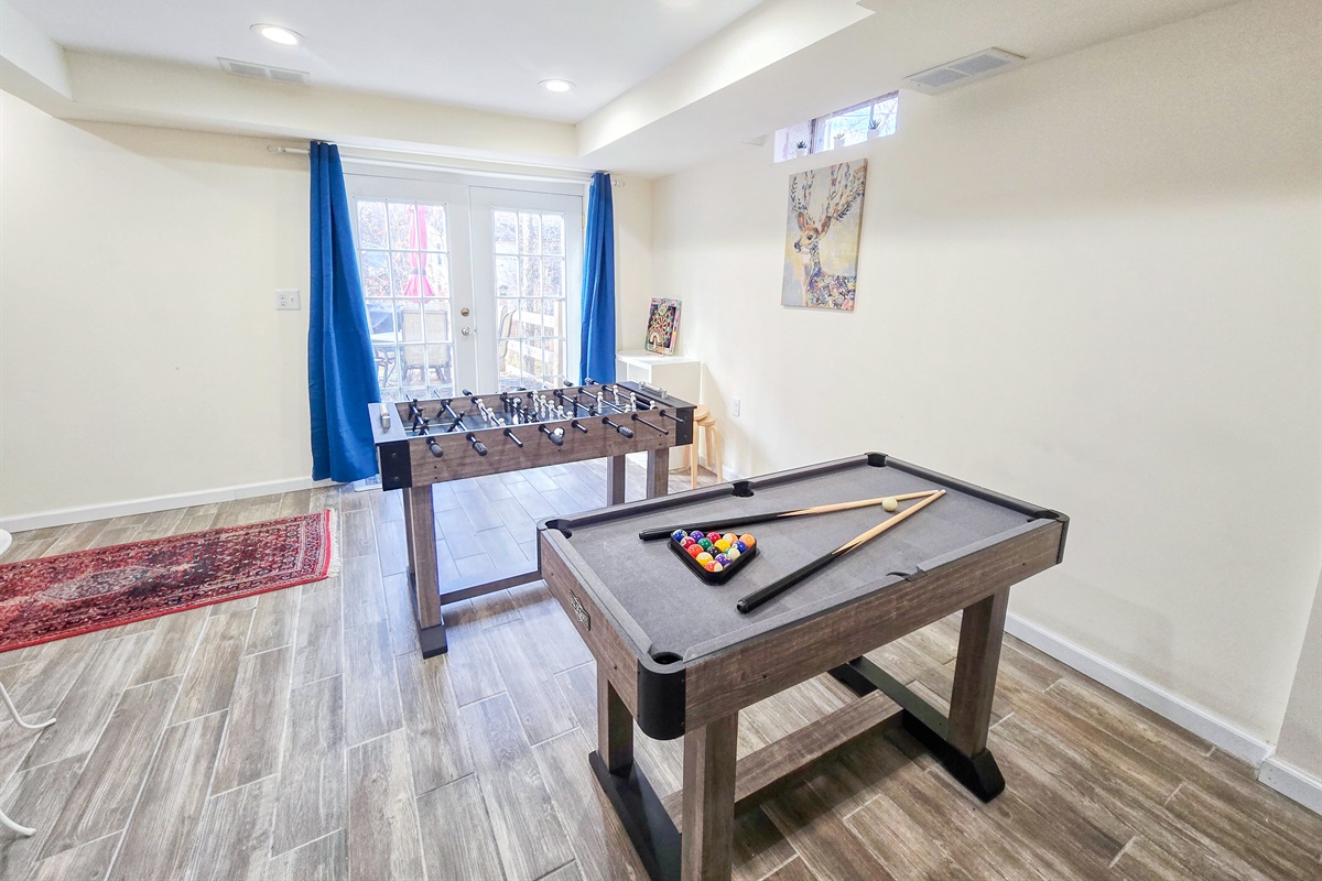 Lower level with Smart TV, PlayStation 5, foosball, mini pool table