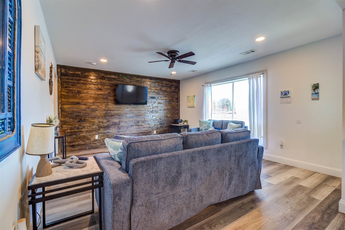 Spacious living room w/ large Smart TV