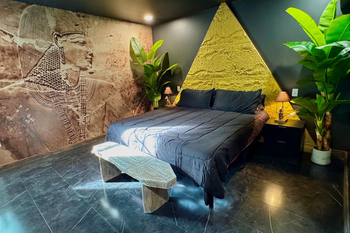 Gold stone headboard and 75” smart TV!
