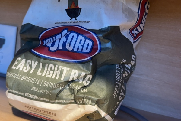 A starter bag of charcoal for the grill is provided