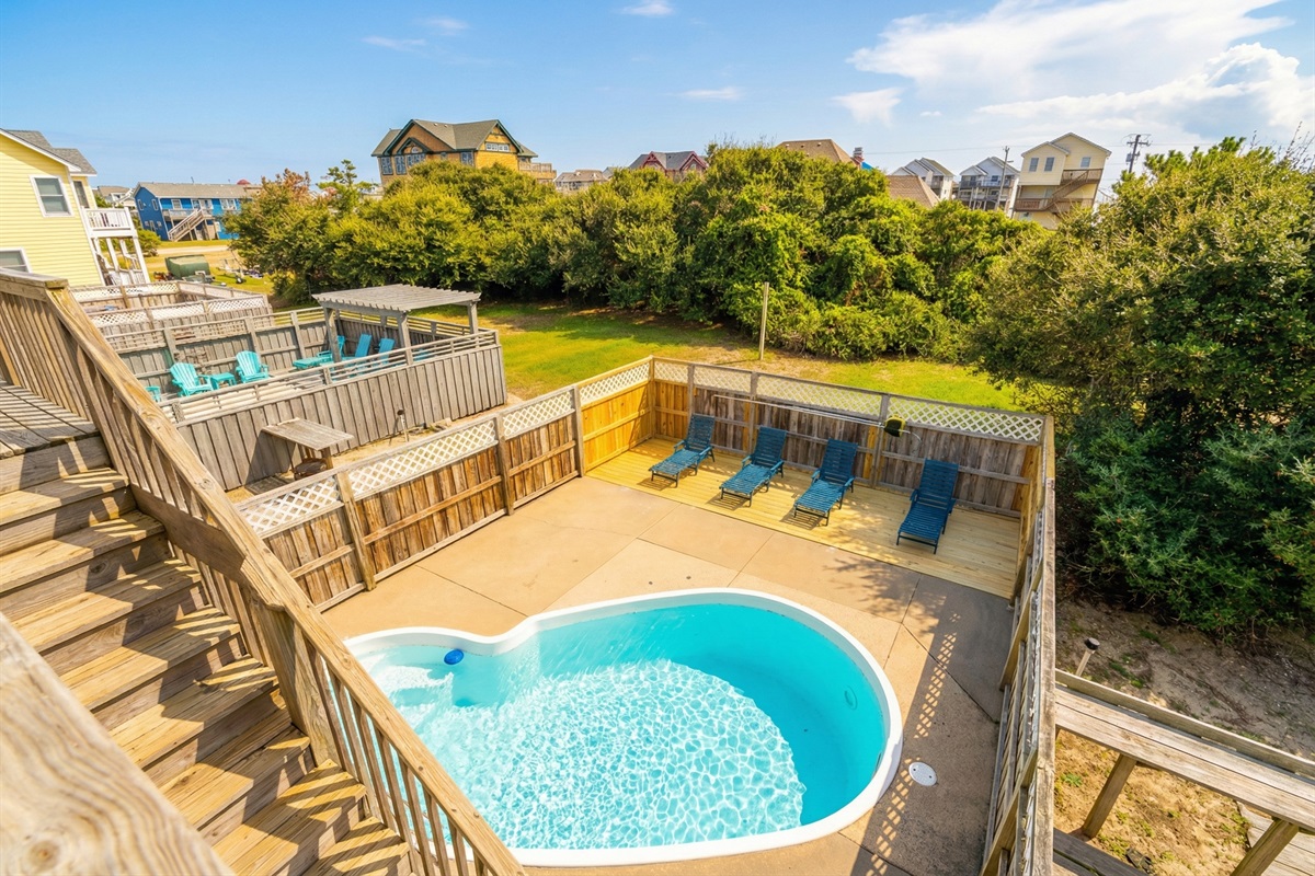 Relax by the poolside and soak up the sunshine.