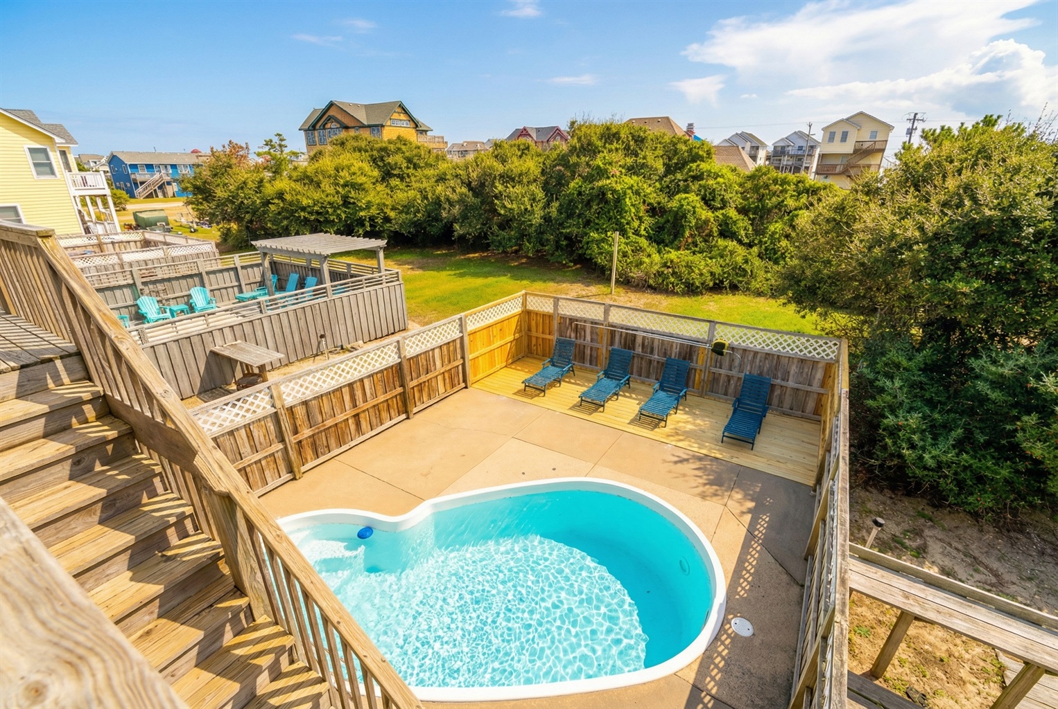 Relax by the poolside and soak up the sunshine.