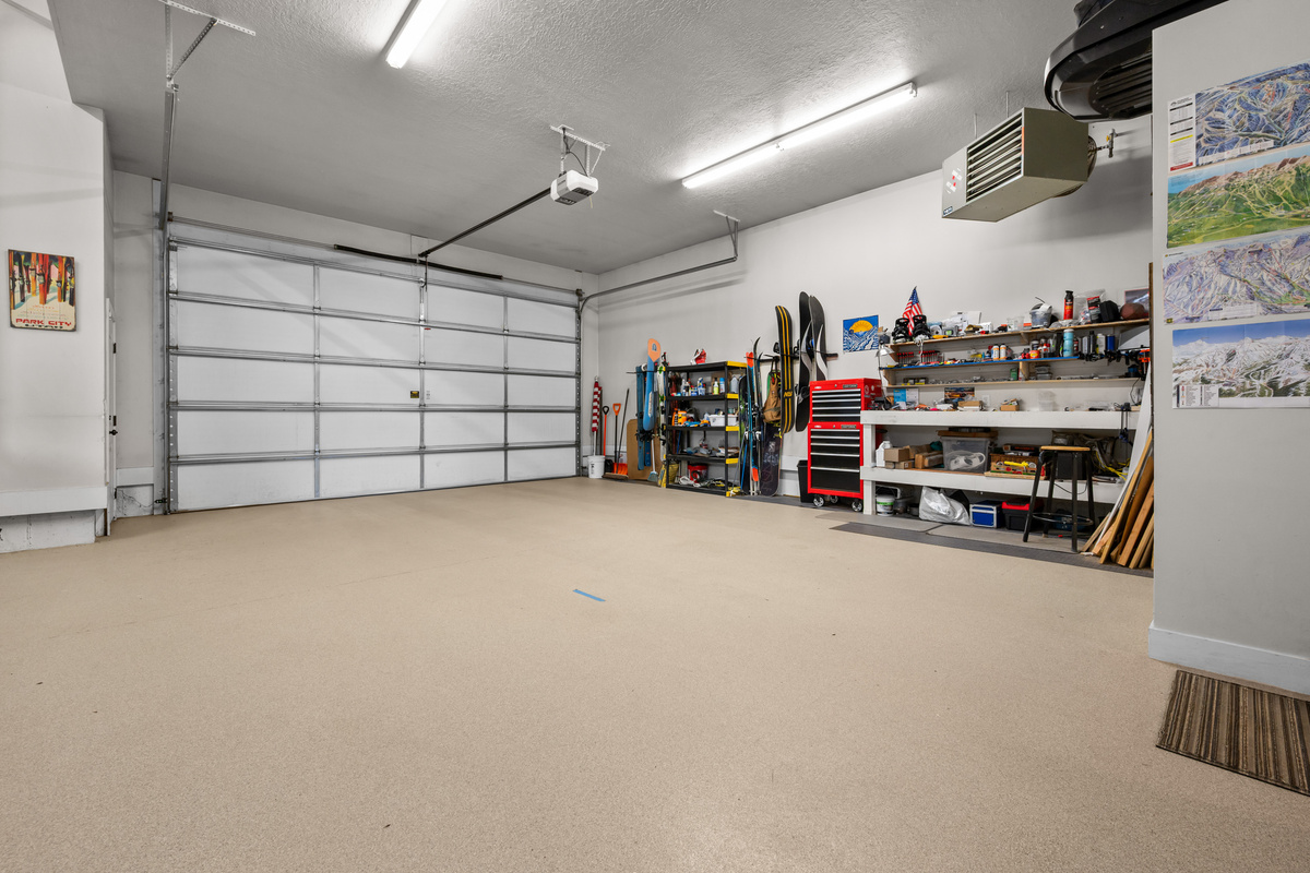 Spacious heated garage offers ample room for storing outdoor equipment and preparing for your next adventure.