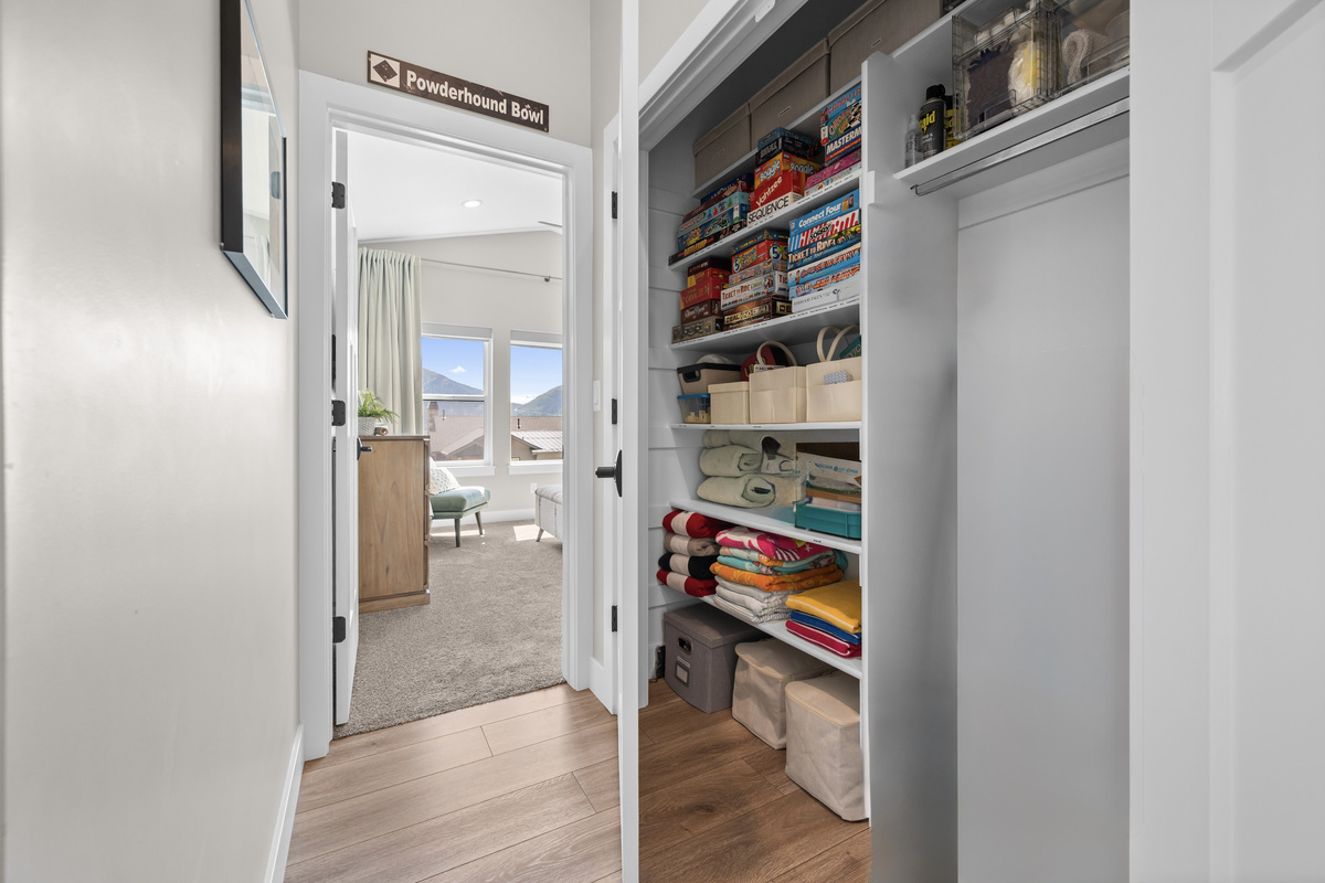 The fully stocked game closet is filled with board games, puzzles, and extra essentials to keep everyone entertained throughout your stay.