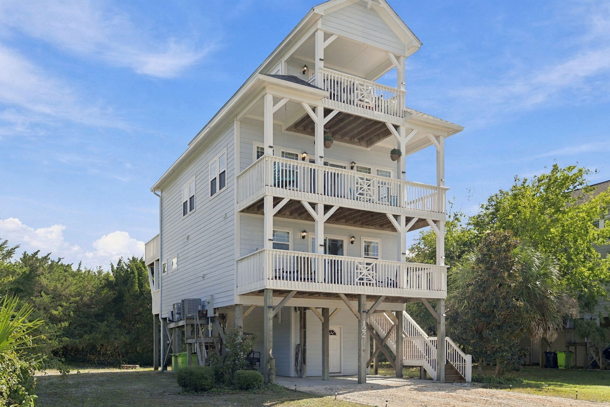 Picture yourself here! A beautiful coastal retreat offering the perfect home base for exploring Topsail Island's beaches, dining, and attractions.