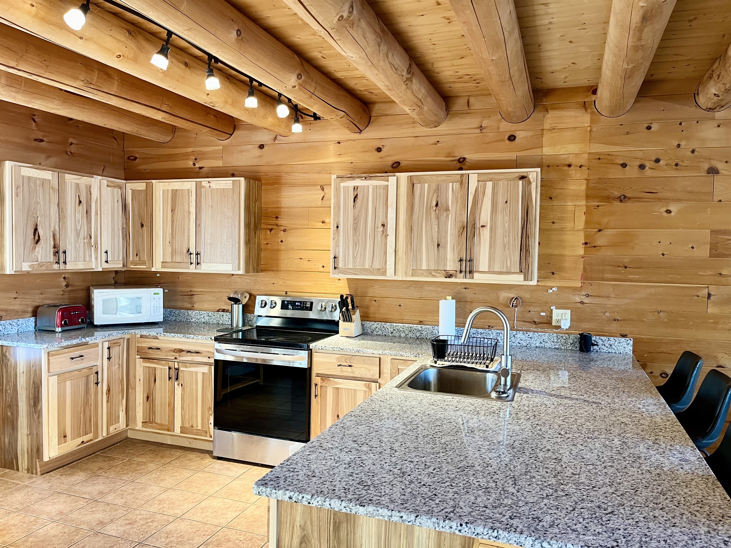 A fully stocked kitchen with all the appliances, cookware, and gadgets you'll need to enjoy family meals, and enjoy coffee breaks.