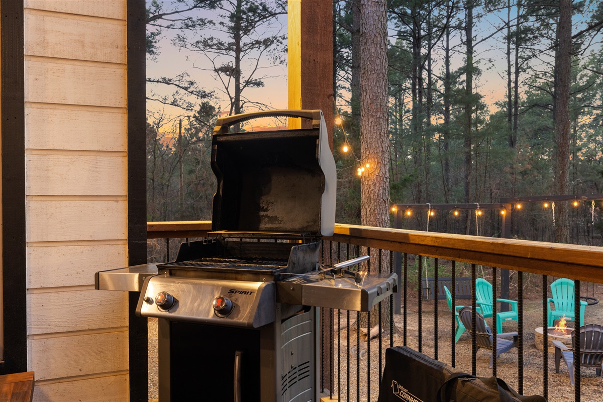 Fire up the grill and savor the simple joy of cooking outdoors in the fresh forest air.