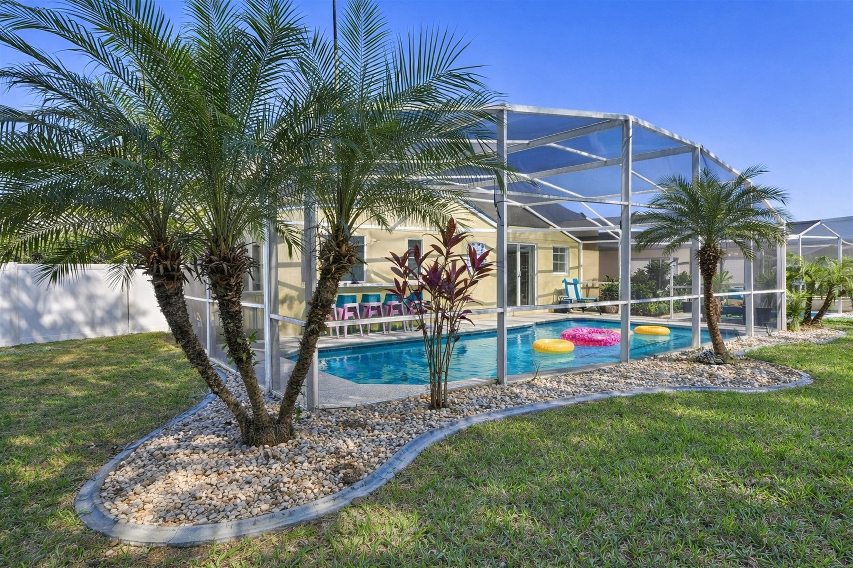 🏖️ Bask in the sun at your private pool retreat, featuring loungers, seating, and optional pool heating