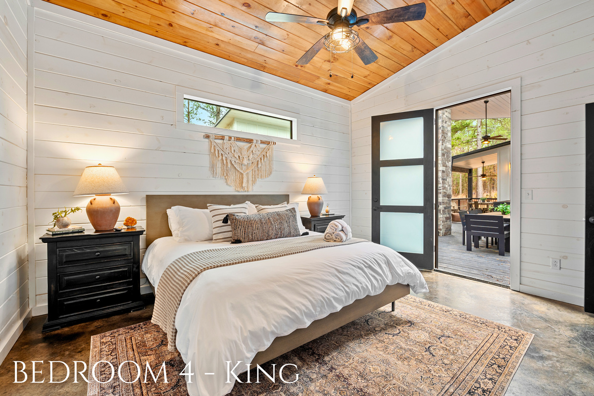 King-size dreams await in this cozy bedroom that opens to your own private deck. Morning coffee in nature? Yes, please!