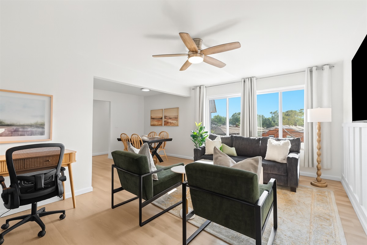 Multiple seating areas provide the perfect layout for gathering, lounging, or working remotely.