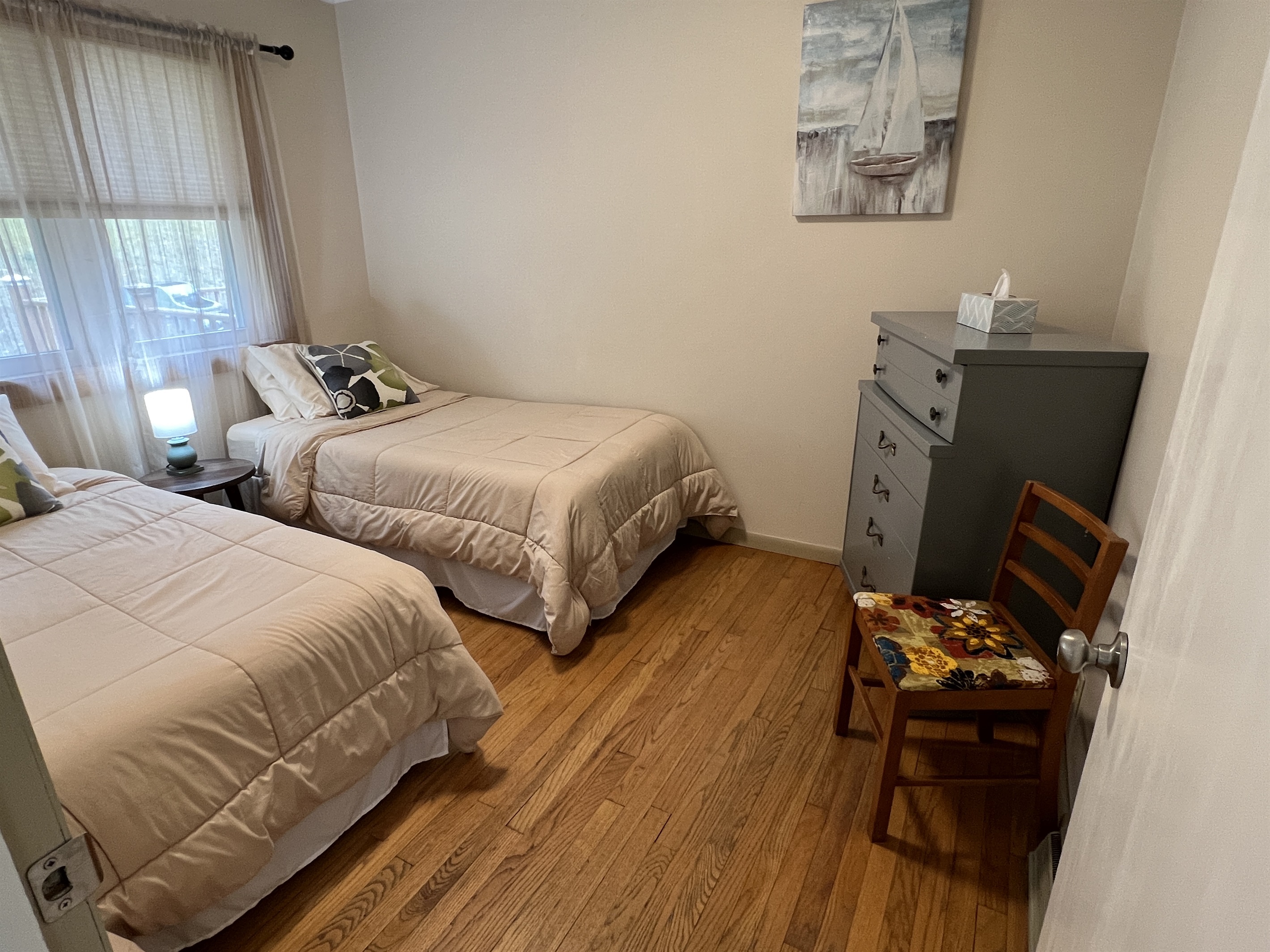 Twin bedroom on the main level located to the left of the bathroom.
