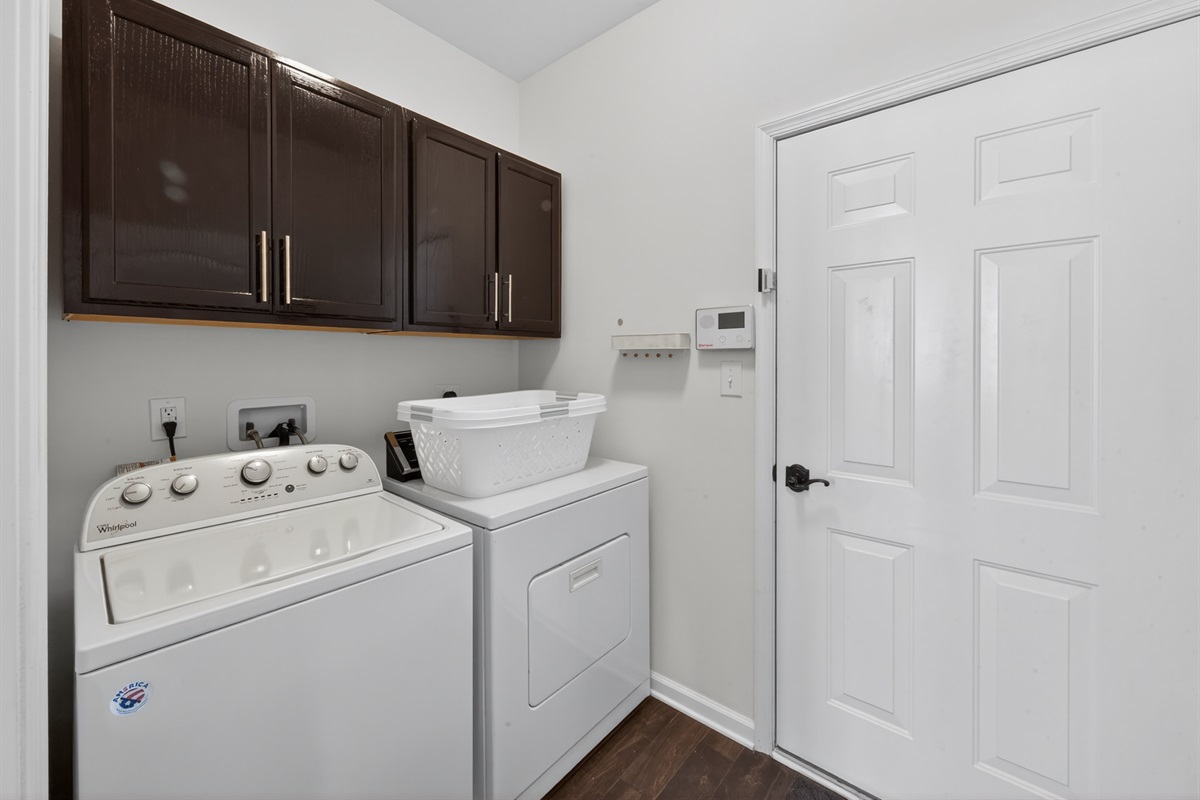 Full size washer and dryer, laundry baskets, ALL Free and Clear laundry detergent, plus other laundry supplies