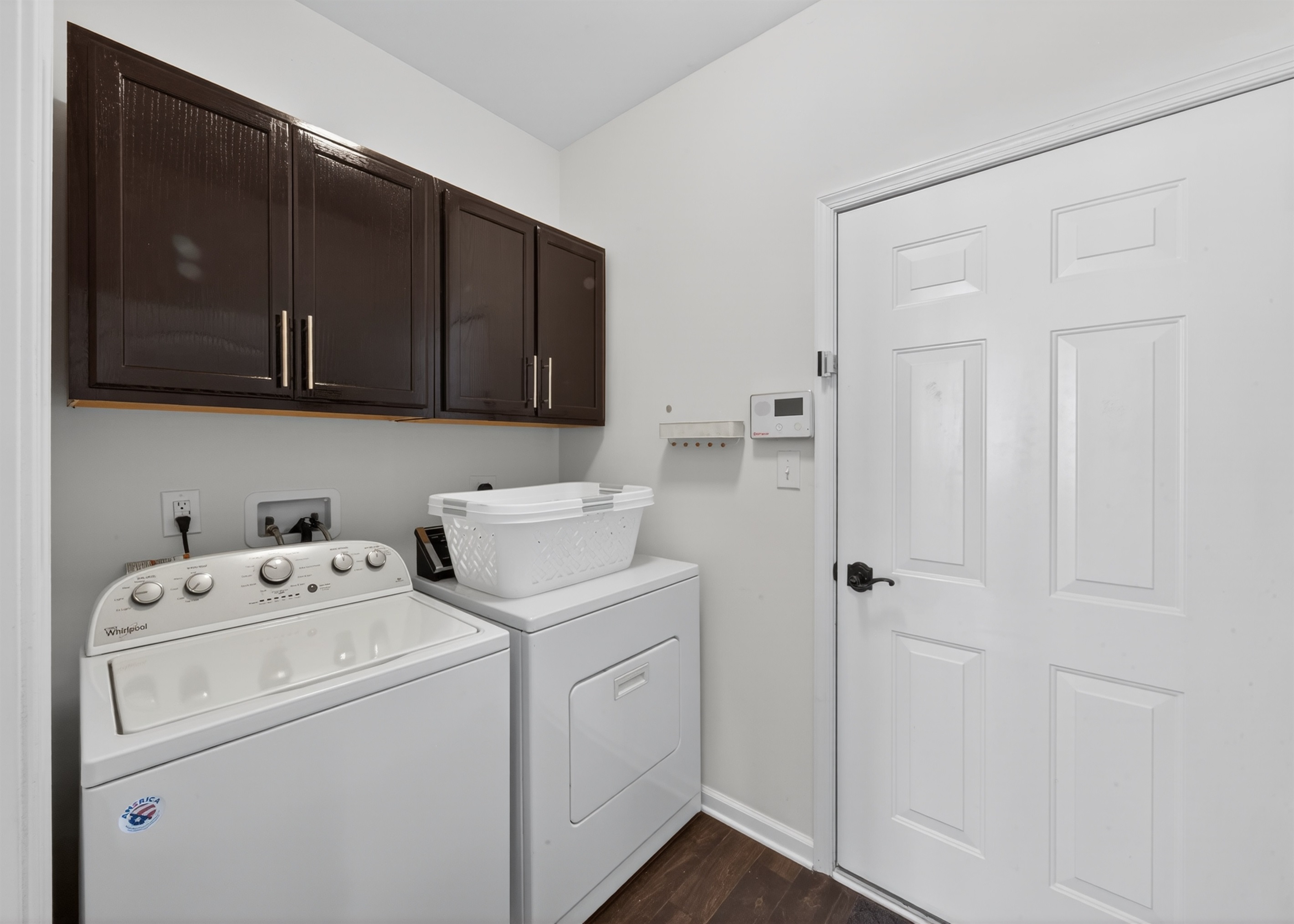 Full size washer and dryer, laundry baskets, ALL Free and Clear laundry detergent, plus other laundry supplies