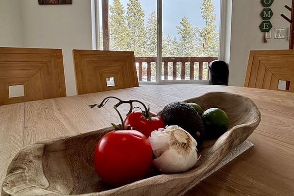 Thoughtful touches—cedar shelves, natural wood textures, and artisan details—create a warm and inviting cabin experience. 