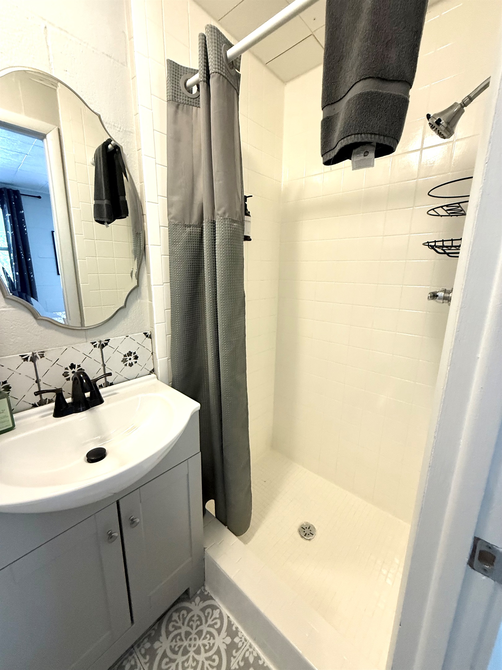 Bathroom with walk in shower.