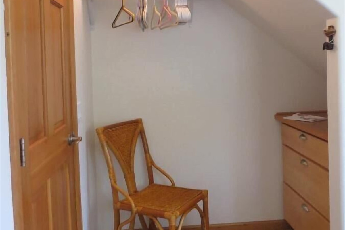 main floor bedroom - Built in hanging rack and dresser
