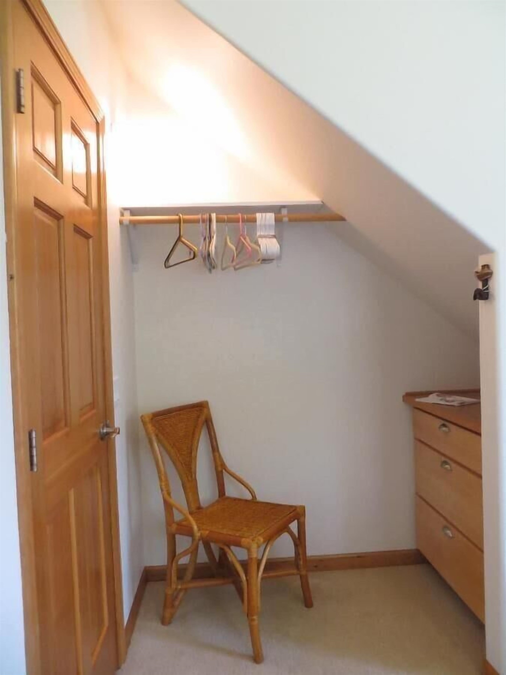 main floor bedroom - Built in hanging rack and dresser