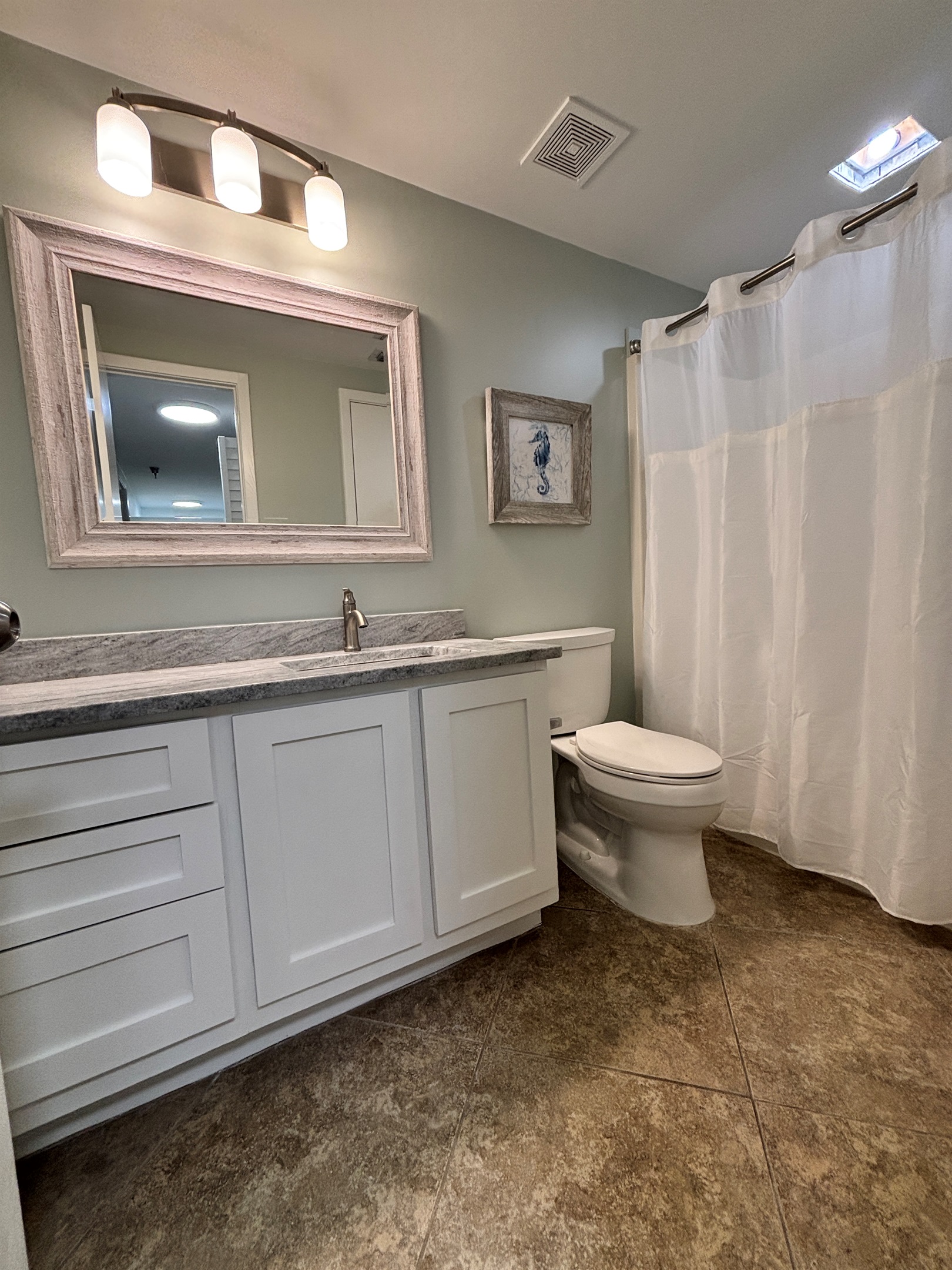 Second full bathroom with tub/shower combo, so no one has to wait to get ready.