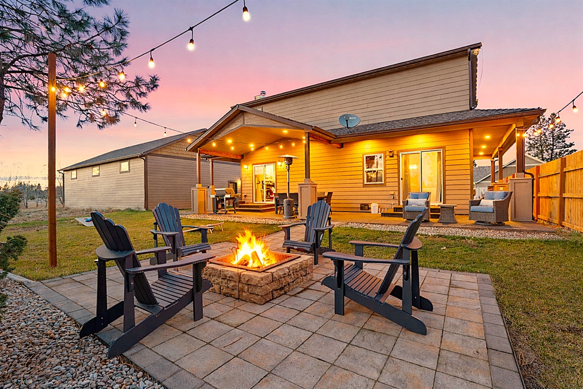 Embrace the outdoors in our beautifully landscaped backyard. Gather around the fire pit for cozy evenings, roast marshmallows, and share stories under the starry sky.