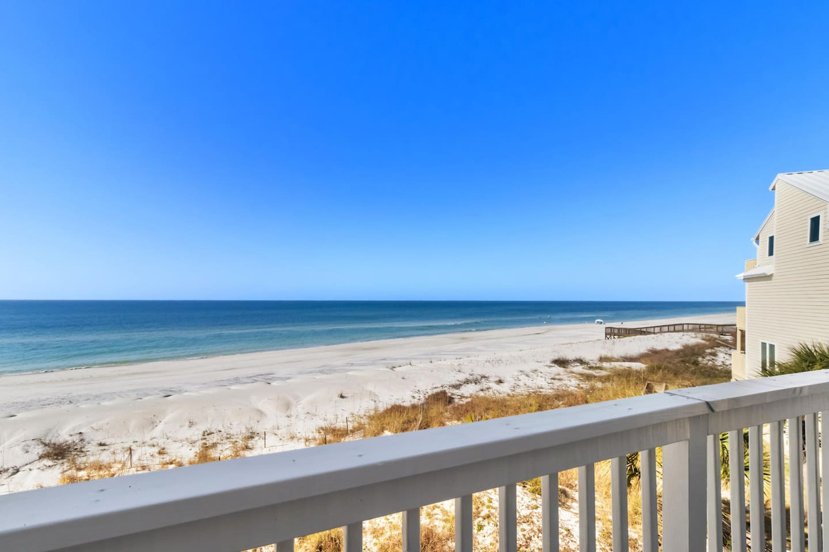 Wake up to a gulf-front view from the master suite &mdash; open your eyes to that and the morning is already won.