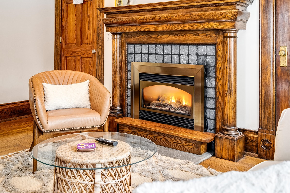 Shared living space with fireplace and tv.