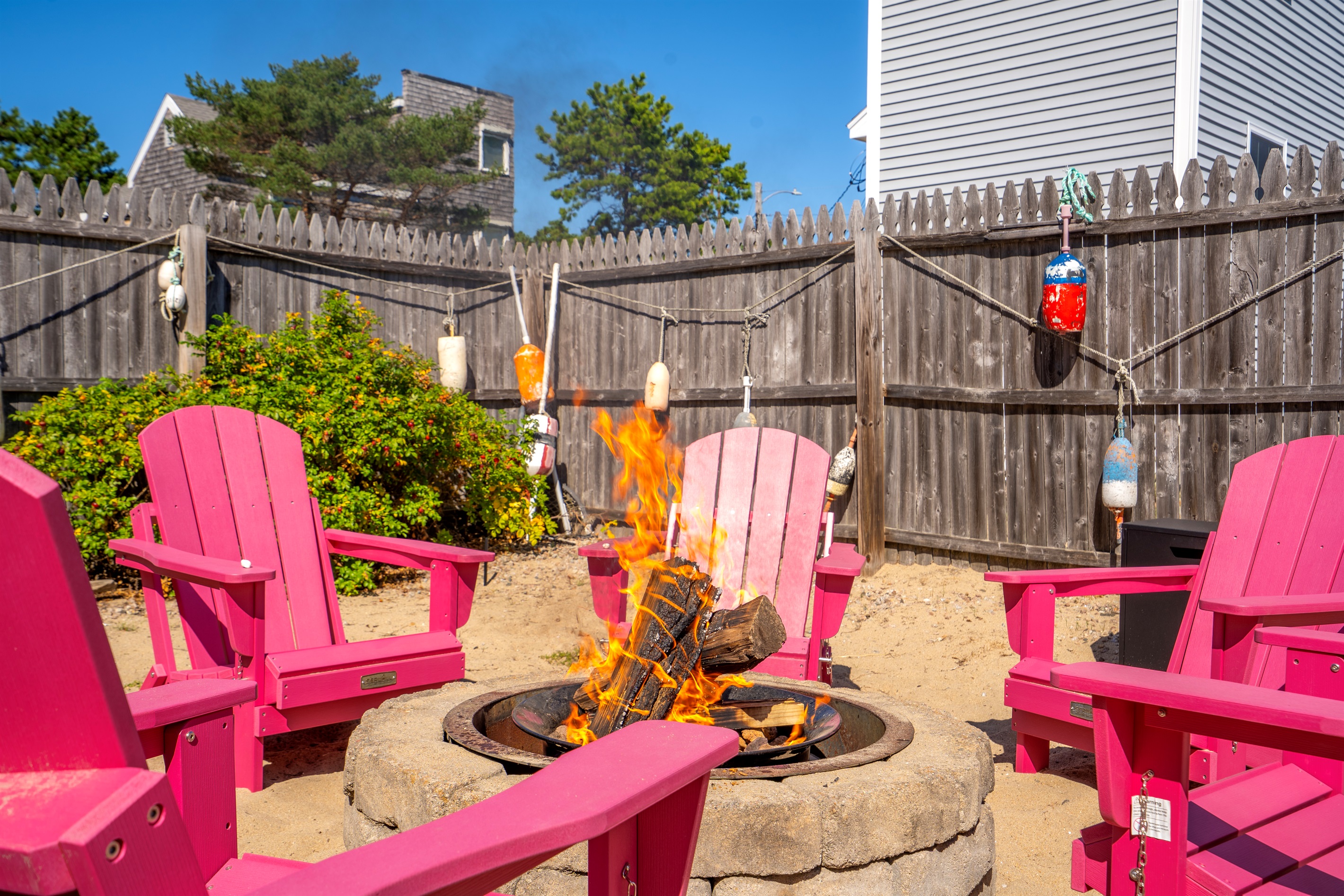 Cozy up by the firepit and enjoy a warm, relaxing evening under the stars.