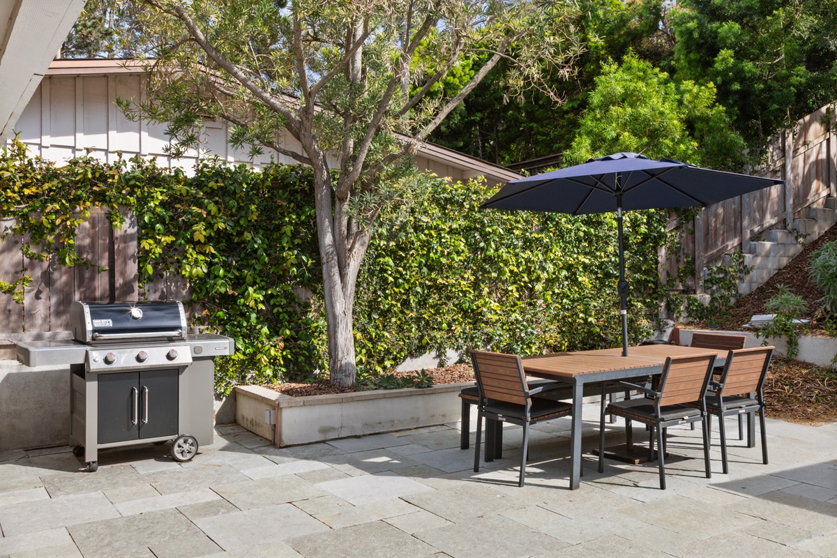 Grill and dine in your spacious back yard