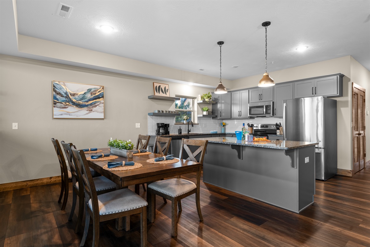 Spacious dining for six just steps from the kitchen and living areas.