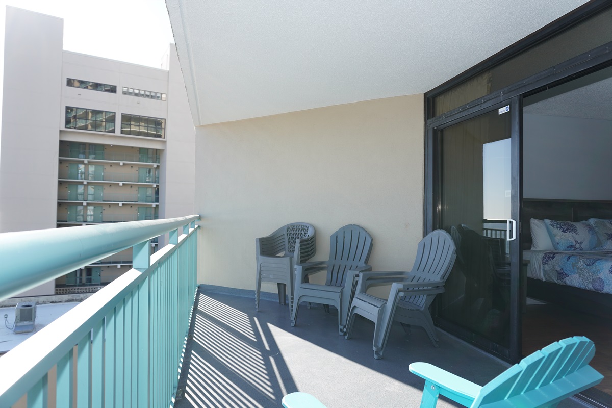 Master bedroom balcony entry to the private balcony with amble seating
