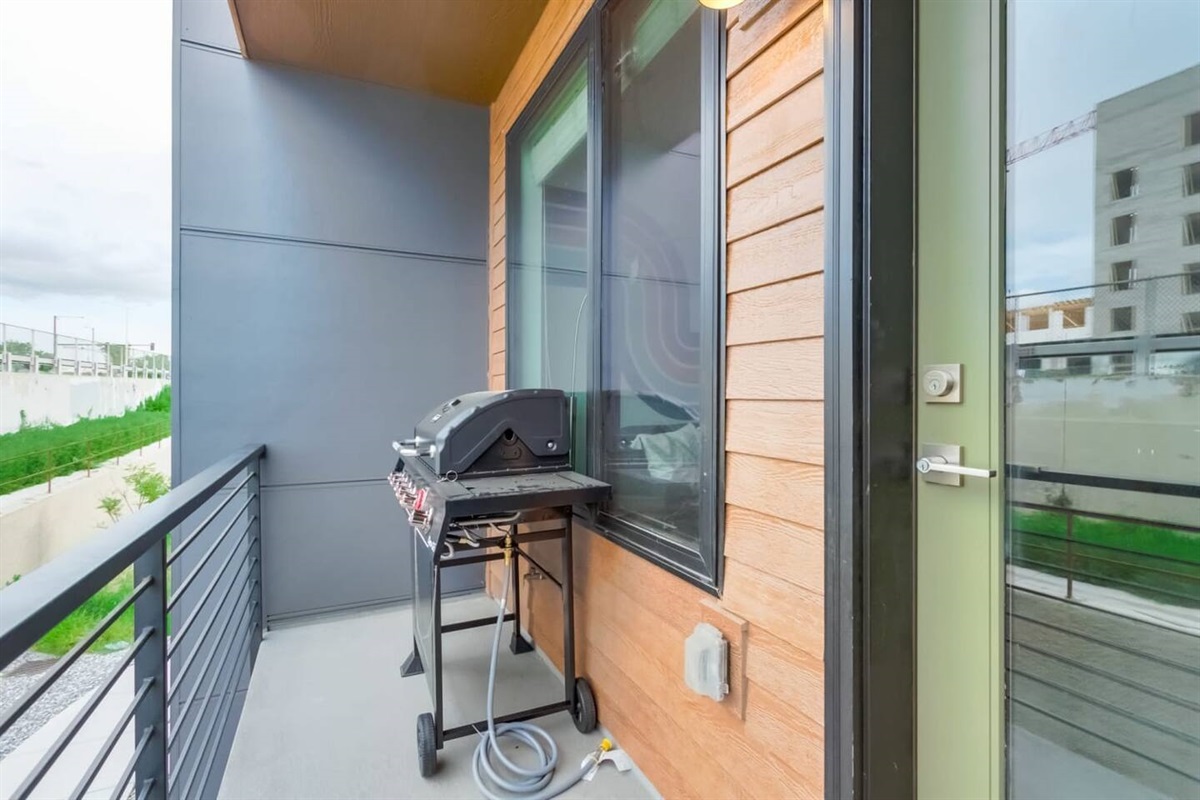A grill for special nights with family and friends, located right off the main living area and kitchen, for easy grilling.