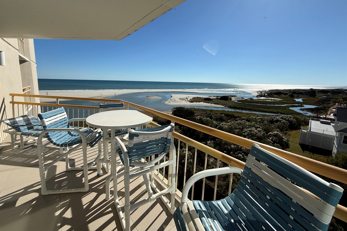 Balcony with Table and Four Chairs + Chaise Lounge