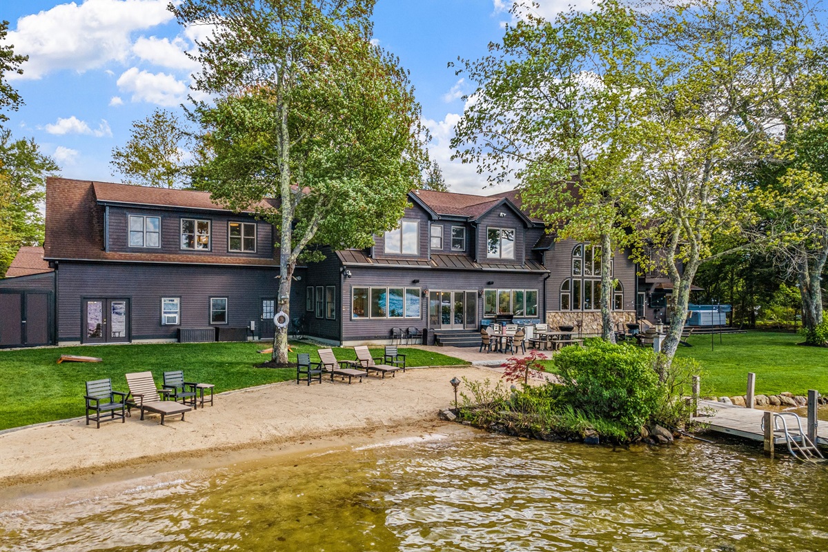 Sugar sand beach and zero entry walk in to the where the sand continues for hundreds of feet