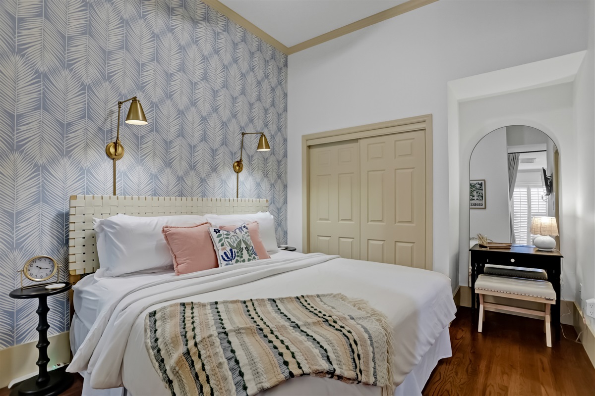 Cozy king bed with soft linens—your perfect retreat after exploring Savannah.
