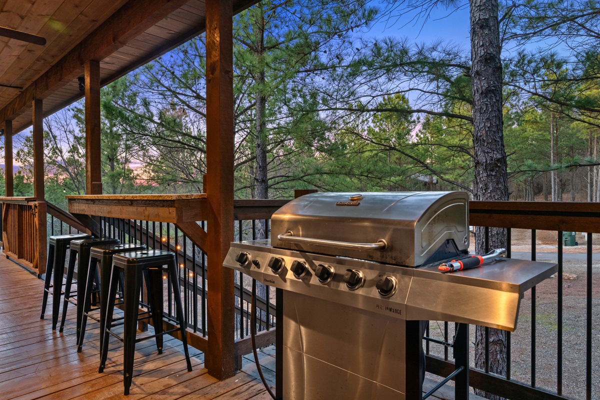 Grill night is always a good idea, and this setup makes it easy to cook outside while everyone hangs out nearby.