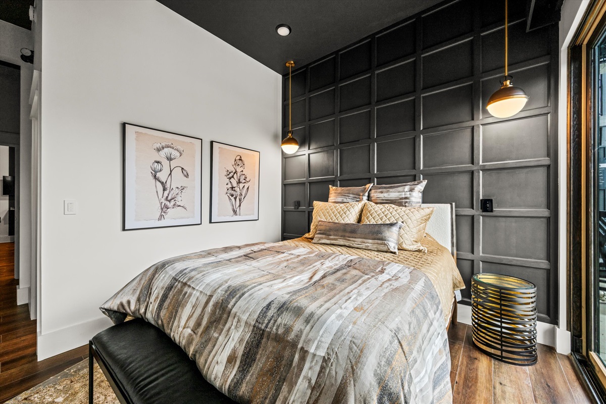 A Queen bedroom with high-end bedding for unmatched comfort.