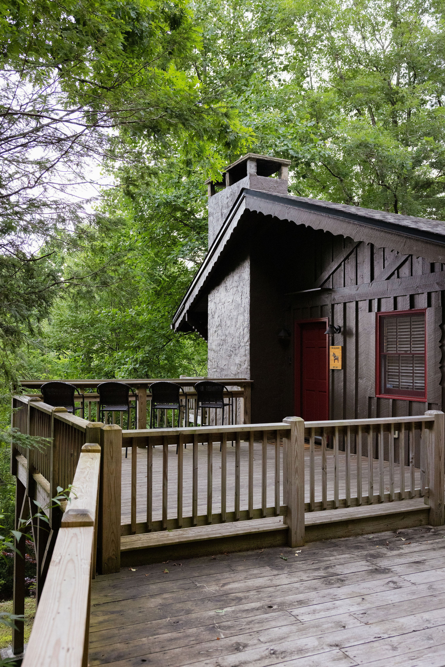 Enjoy peaceful woodland surroundings, beautiful sunsets, and seasonal glimpses of the surrounding mountains from the front deck.