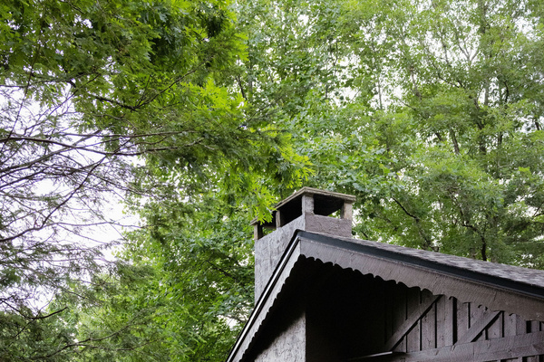 Enjoy peaceful woodland surroundings, beautiful sunsets, and seasonal glimpses of the surrounding mountains from the front deck.