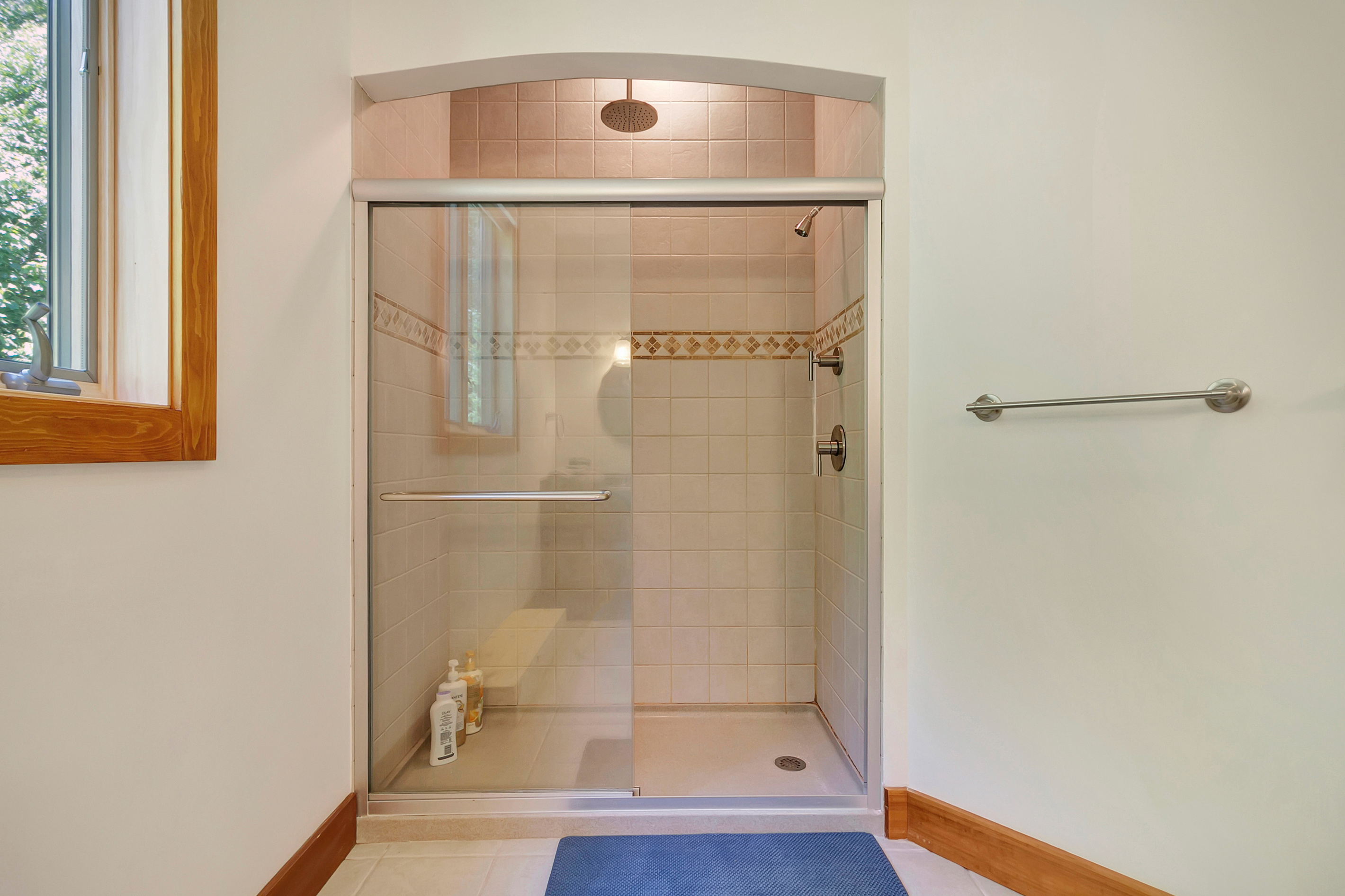 A large shower with a rain head