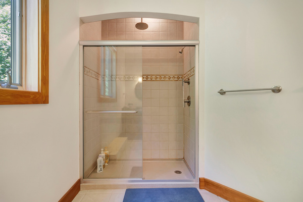 A large shower with a rain head