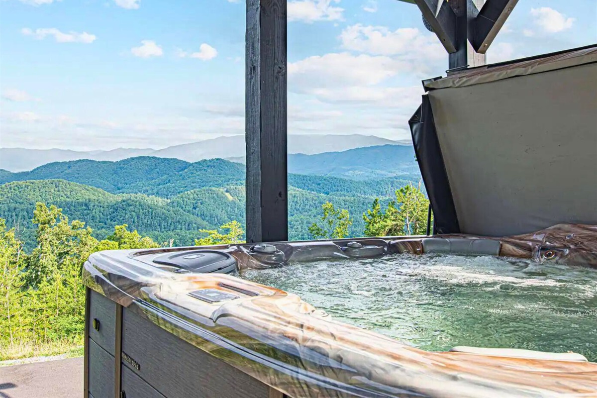 Hot Tub on the Main Level Covered Deck Adjacent to the Pool Room
