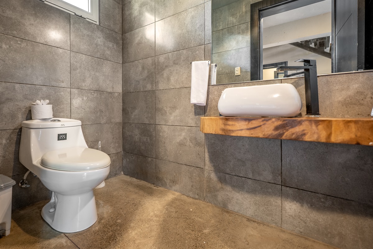 Clean bathroom with a modern design and good water pressure.