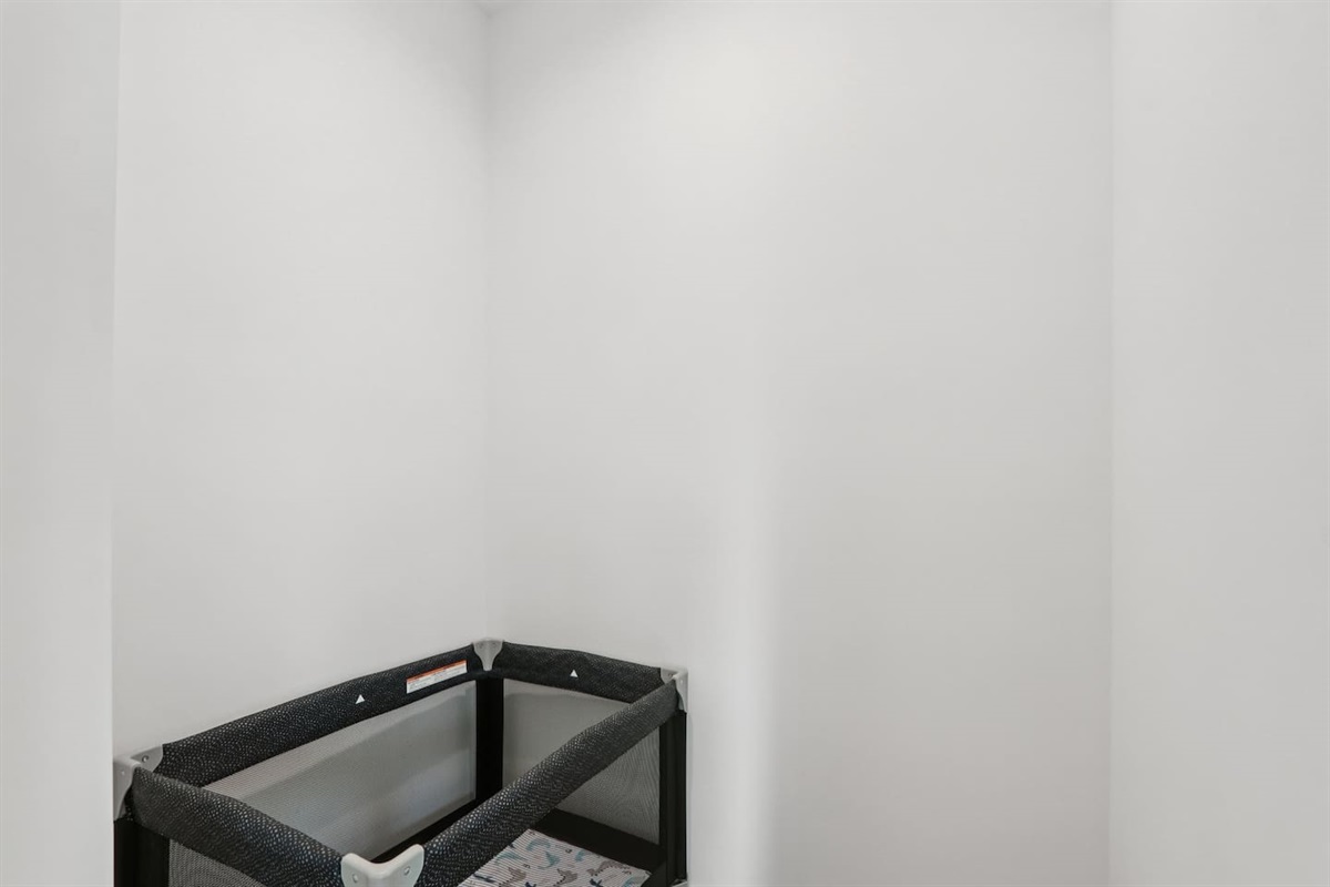 Primary Bedroom has King Bed with Twin Trundle underneath, pack n' play in closet, full en-suite bathroom, 2 closets, Smart TV
