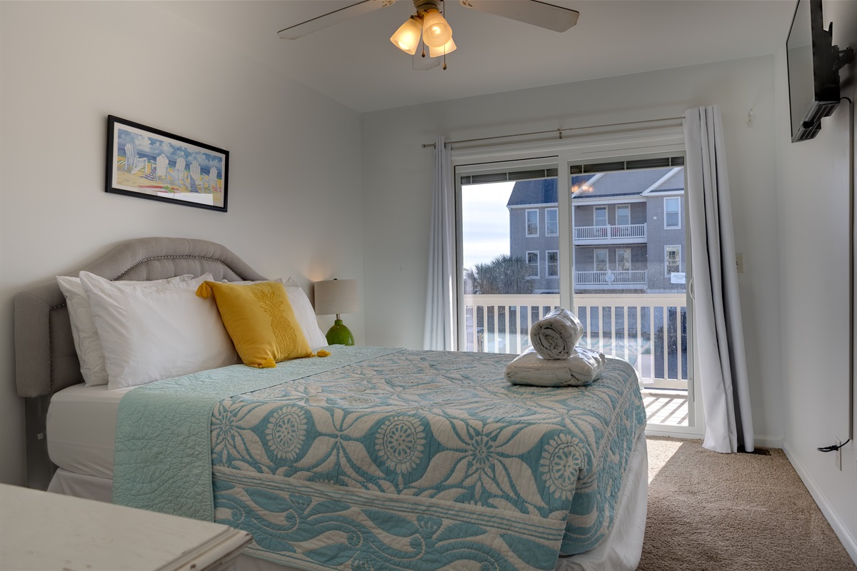 3rd bedroom with private balcony access: wake up to natural light, step outside for fresh ocean air, and unwind in a calm, coastal retreat