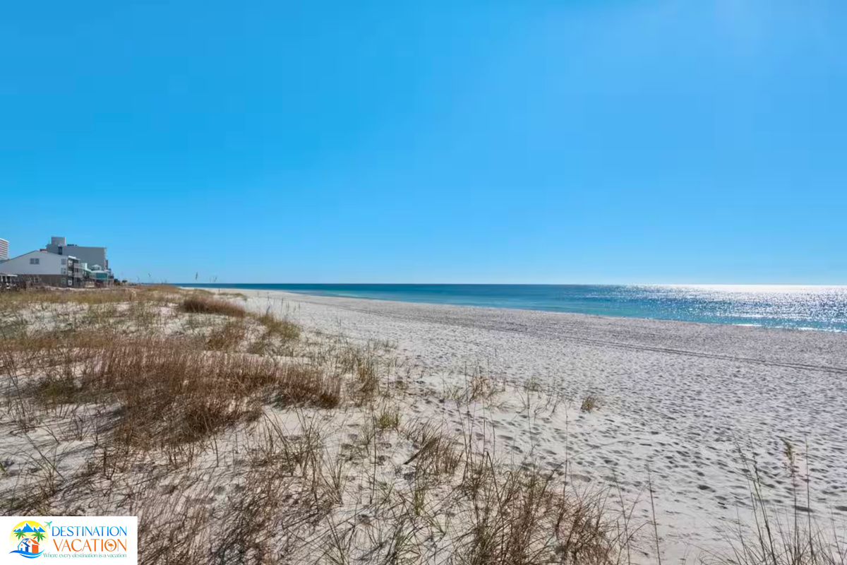 Golden sands and blue waters await nearby.