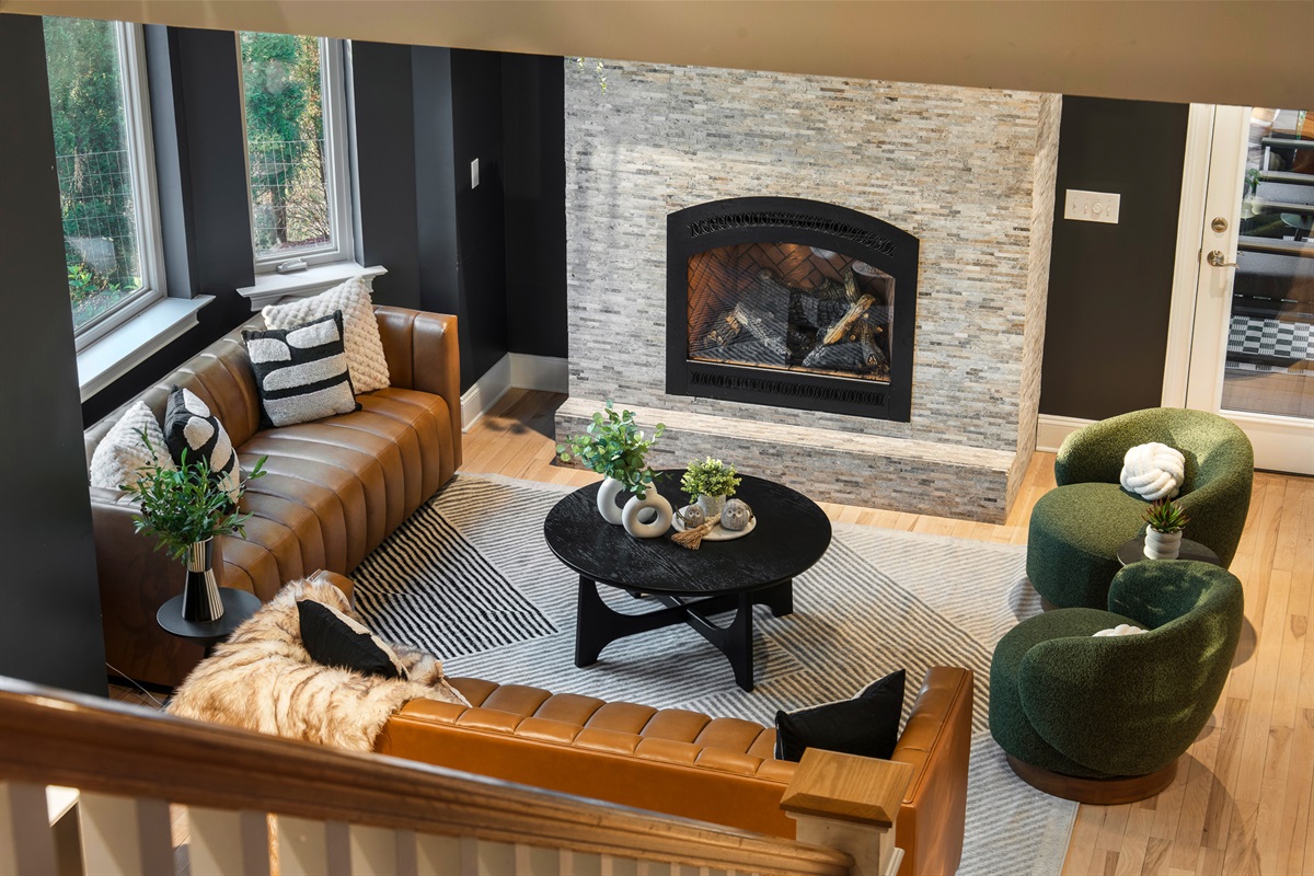 Comfortable gathering space centered around the fireplace - built for connection, not just capacity