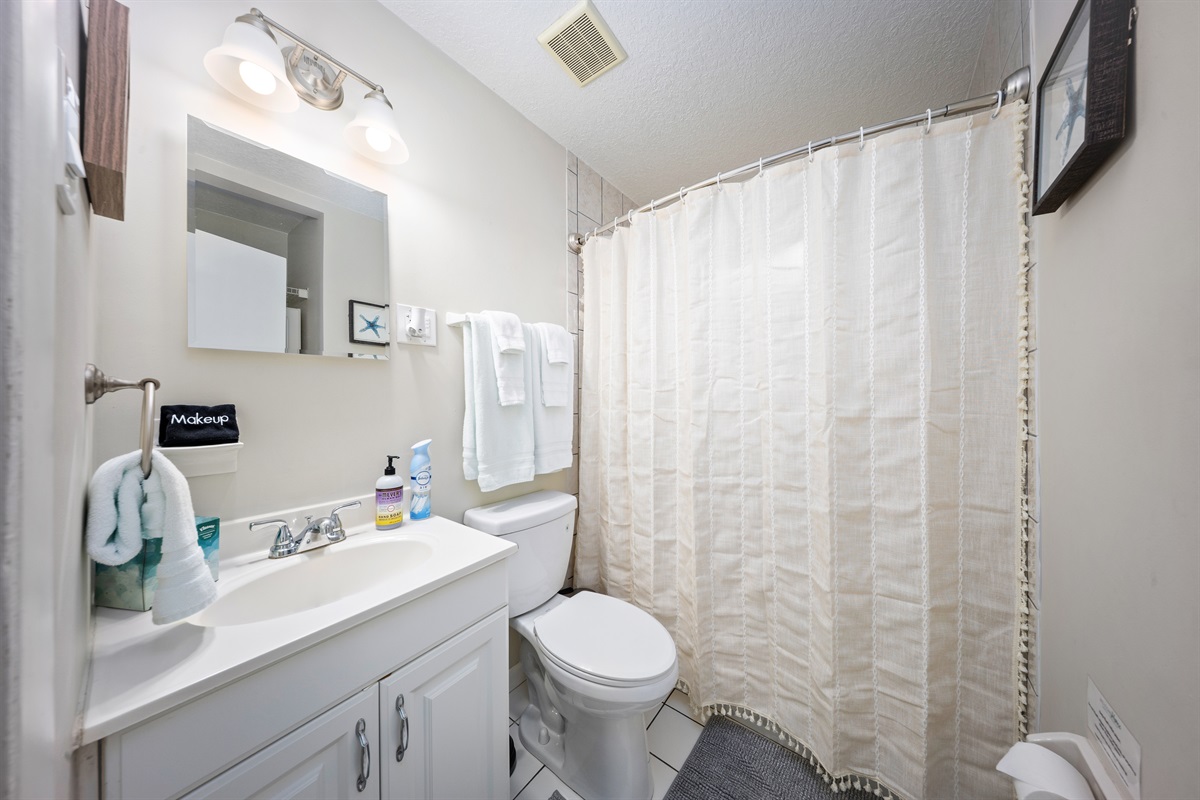 Guest bathroom with tub/shower combo